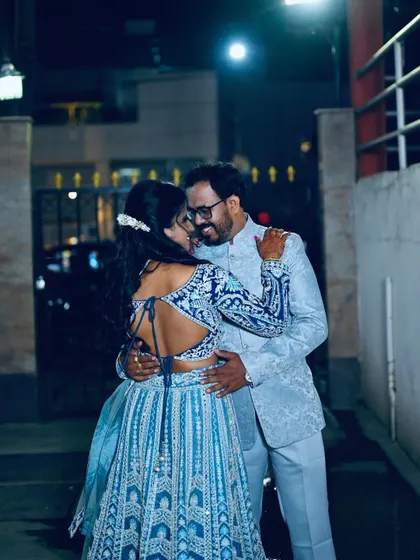 A beautiful back shot of the blue embroidered lehenga, showing off the stunning open-back design of the blouse. It’s these details that make an outfit special.