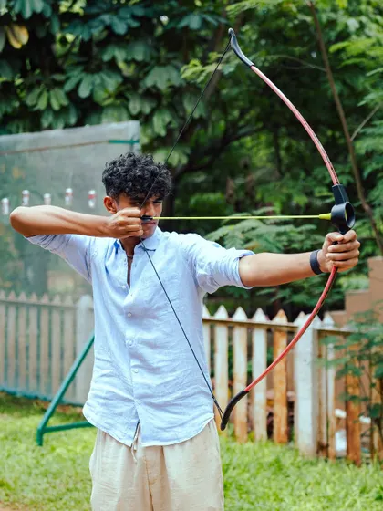 Feel the satisfying pull of the bowstring as you prepare to shoot. Archery is an ancient sport that builds discipline and provides a deep sense of accomplishment.