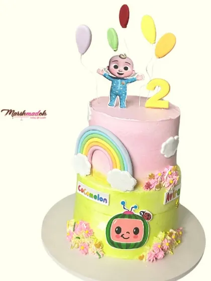 This two-tiered Cocomelon cake features two different flavours: the top is chocolate and peanut butter, and the bottom is a refreshing mango Chantilly. All the colourful toppers are made from scratch and are fully edible.