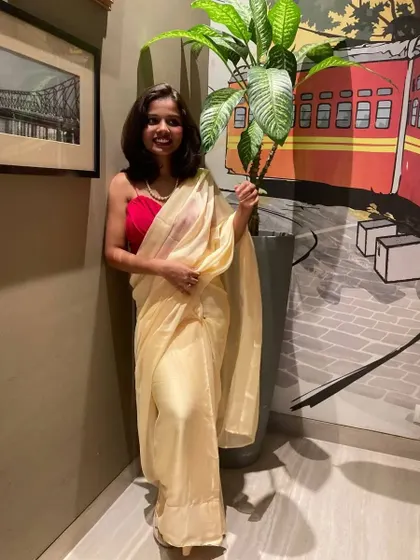 A smiling photo in my convocation outfit.