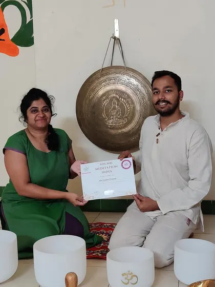 Presenting a certificate to a graduate from October 2022. It brings me great joy to see her thriving and using the instruments from my store in her own practice.