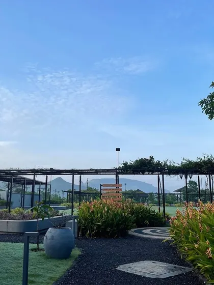 The serene landscape of our retreat venue, with mountains in the distance. Nature provides the perfect backdrop for deep inner work and connection.