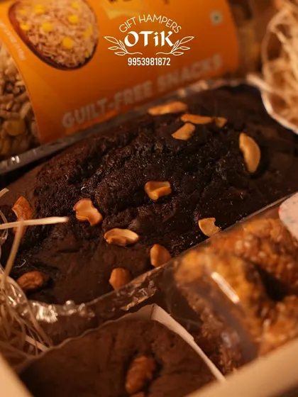 A close-up of a festive hamper, showcasing the detail and care I put into every order. Sweeten your celebrations with my delicious, handcrafted cakes and treats.