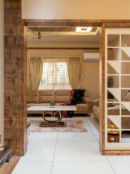 A close-up view of the wooden swing and the geometric partition, highlighting how we use traditional elements within a contemporary interior design framework.