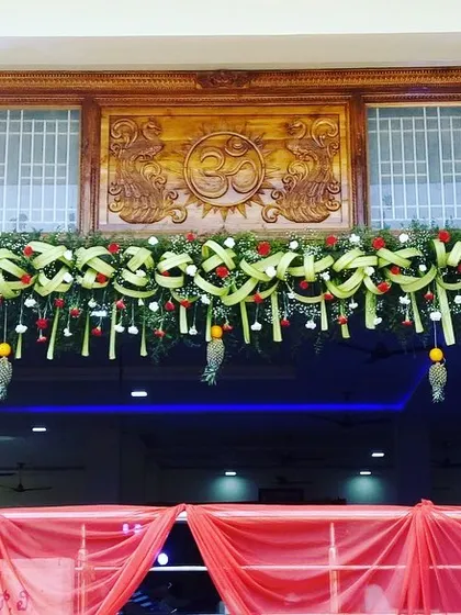 This detailed shot of the entrance decor highlights the intricate weaving and floral work. It’s a perfect example of how I blend traditional craftsmanship with elegant design to honor your heritage.