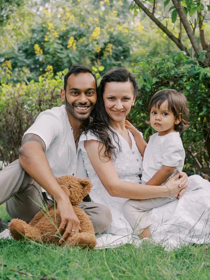 A family portrait with a serious-looking toddler. I capture all the moods, because they are all part of the story.