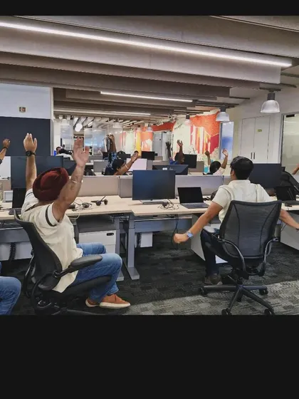 Another view of the active stretching during the Delta Air Lines corporate yoga workshop.