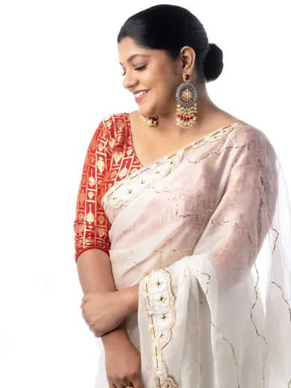 A candid moment with Aparna Balamurali. Her smile truly completed the look we created together.