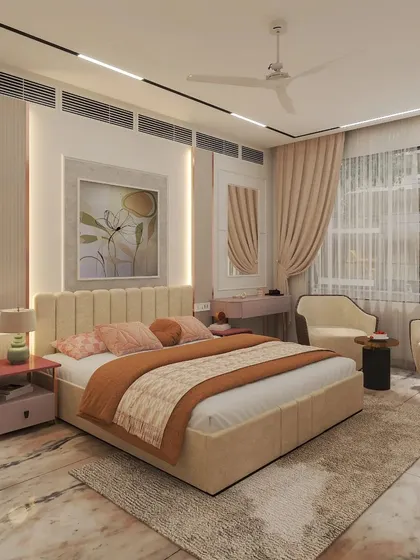 Designed for our client's grandparents, this serene bedroom in Lajpat Nagar uses a soft, neutral color palette and plush furnishings to create a peaceful atmosphere.