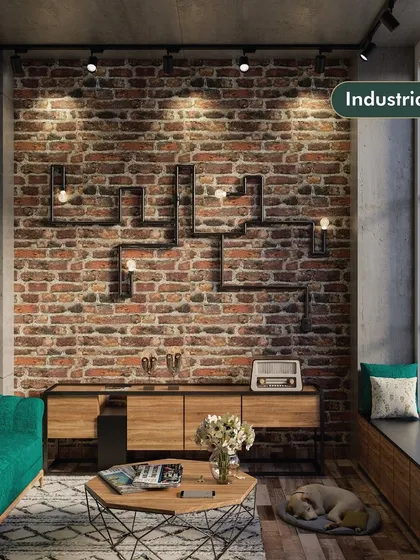 An industrial-style living room featuring an exposed brick wall, metal pipe-inspired light fixtures, and a mix of wood and metal furniture. The large window and cozy seating make the space feel both edgy and comfortable.