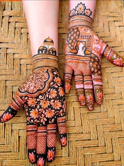 A unique design combining a dense floral pattern on one hand with a traditional Ganesha and peacock motif on the other.