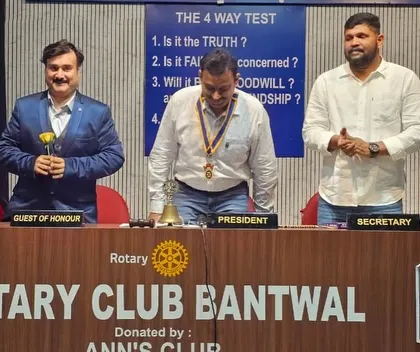A moment from my performance at the Rotary Club event. Even in a formal setting, I make sure my magic is interactive and brings a smile to everyone's face.