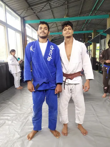 With a tough training partner after my promotion. You are only as good as the people you train with.