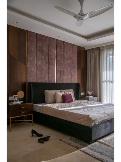 A black bed can be incredibly elegant. For this room, we paired our custom black wingback bed with rich walnut veneer paneling, creating a bold and sophisticated contrast that feels both modern and timeless.
