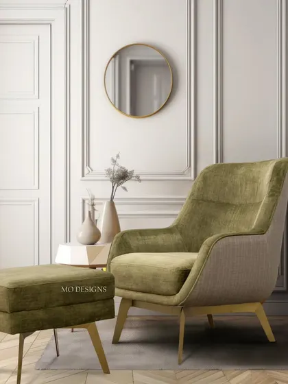 This armchair and matching footstool are designed for pure relaxation. The combination of olive green velvet and a lighter textured fabric, set on elegant tapered legs, creates a luxurious duo for unwinding after a long day.
