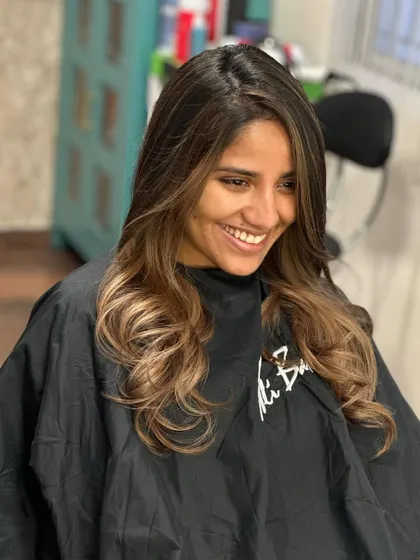 The client's smile says it all. A beautiful and successful transformation.