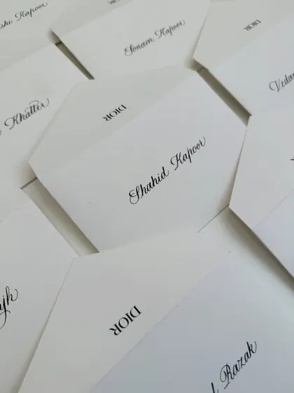 A bunch of notecards with hand-addressed envelopes for Dior Beauty. The elegance of calligraphy adds a personal and luxurious touch to any form of correspondence.