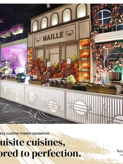 A grand, European-themed food station named "Maille." This custom-built facade demonstrates our ability to create fully realized restaurant concepts for your event.