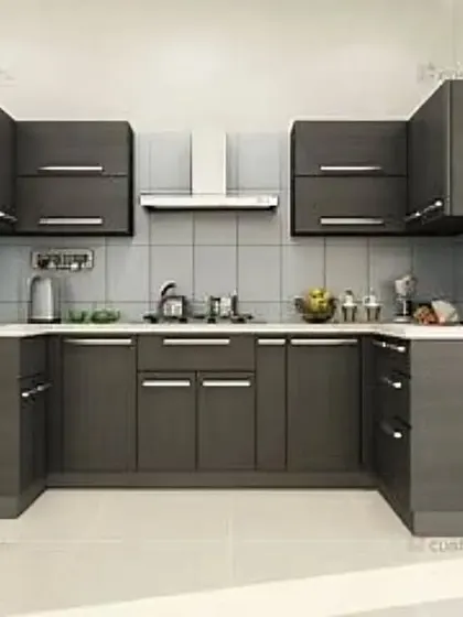 This simple and practical U-shaped kitchen features dark grey cabinets that provide ample storage. The design is straightforward and functional, ideal for daily use.