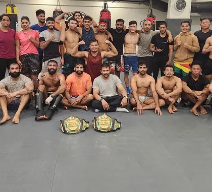A competition team update celebrating recent victories at MFN 13 and Warrior Dream Series. This group photo shows the champions and the team that helped them get there.