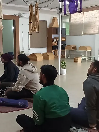 Students attentively participating in a practical session during our free Medical Yoga workshop.