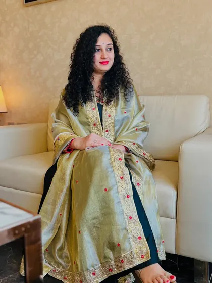 Another shot of Pragathi, showing her grace and the beauty of her custom outfit.
