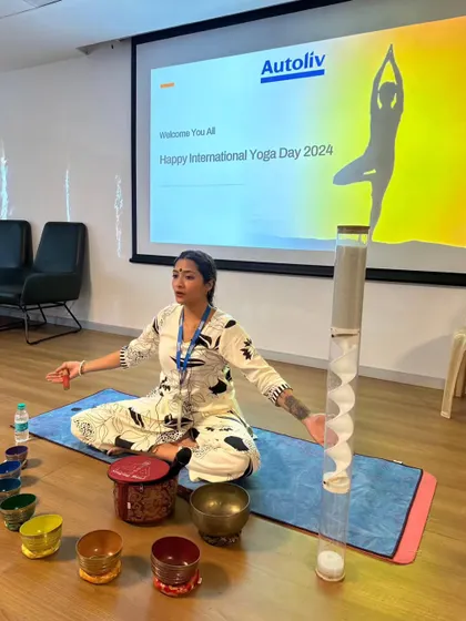 It was an honor to facilitate a session for International Yoga Day at Autoliv, a global leader in automotive safety. Here I am, seated with my instruments, ready to guide the employees through a journey of sound.
