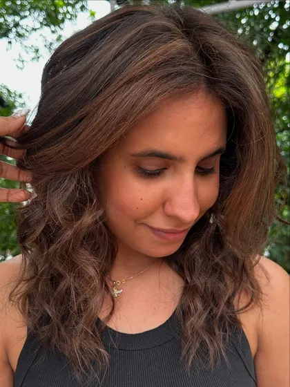 A close-up of the soft waves and highlights for her holiday look.