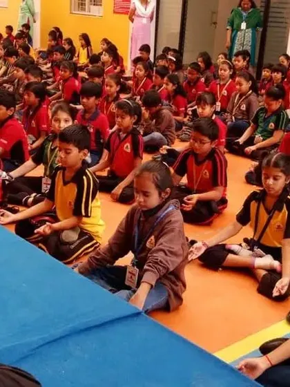 Leading a large group of school children in a yoga and meditation session. My goal is to make mindfulness fun and accessible, planting the seeds for a healthy and balanced lifestyle from a young age.