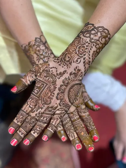 A beautiful, non-symmetrical design for a friend. The patterns are different on each hand but work together to create a cohesive look.