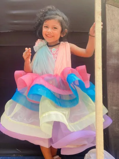 A vibrant and joyful photo from a young participant's portfolio.