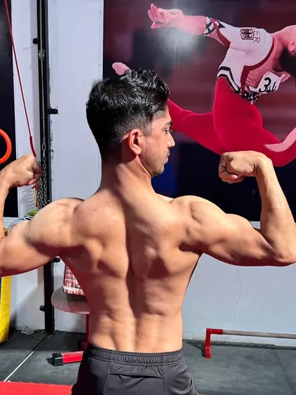 As the founder and a national gold medallist, I lead by example. The physique you see is built from years of dedicated gymnastics and calisthenics, the same principles we teach at our academy.