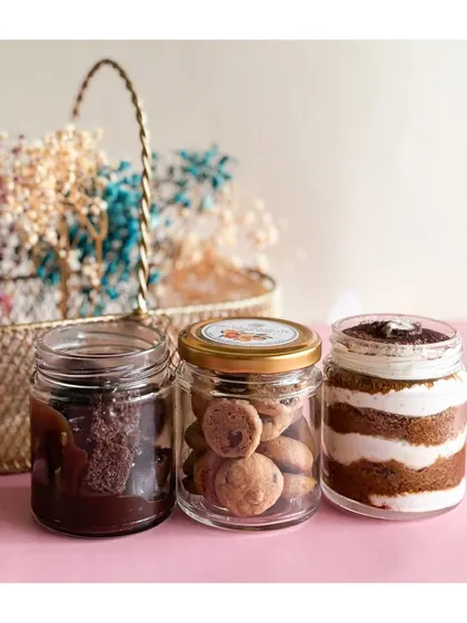 Make any celebration extra special with our desserts. This trio includes a brownie jar, a jar of mini cookies, and a classic Tiramisu dessert jar.