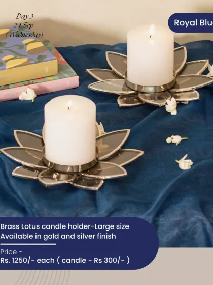 For the day of Royal Blue during Navratri, these brass lotus candle holders in a silver finish create a serene and majestic ambiance. They are available in both gold and silver.