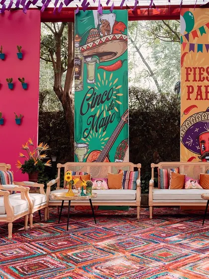 A duplicate of image 294, showing the comfortable seating area with its festive banners.