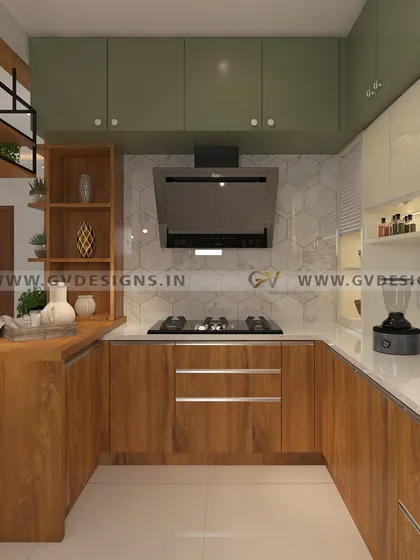 A second view of the olive green kitchen, highlighting the breakfast counter and the open metal stack shelving. This provides a stylish, accessible storage solution and a casual dining spot.