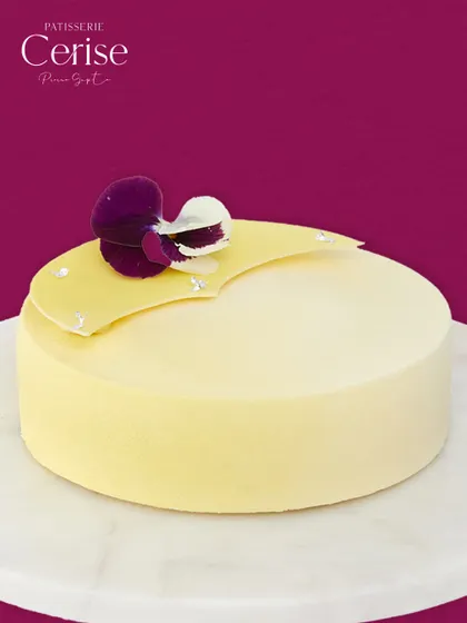 L’Exotique, a vibrant symphony of tropical flavours. This entremet captures the essence of pineapple, passion fruit, and mango in every bite.