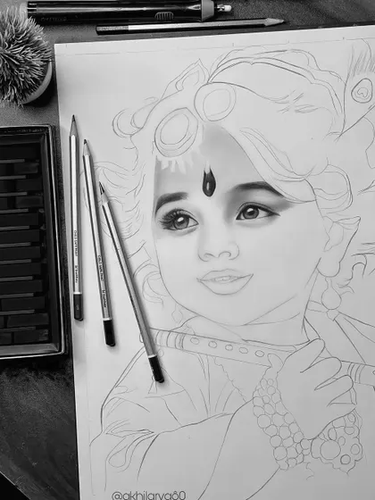 A close-up of a work-in-progress charcoal sketch of Shri Krishna. You can see the initial layers of shading on the face, which slowly build up to create a realistic portrait.