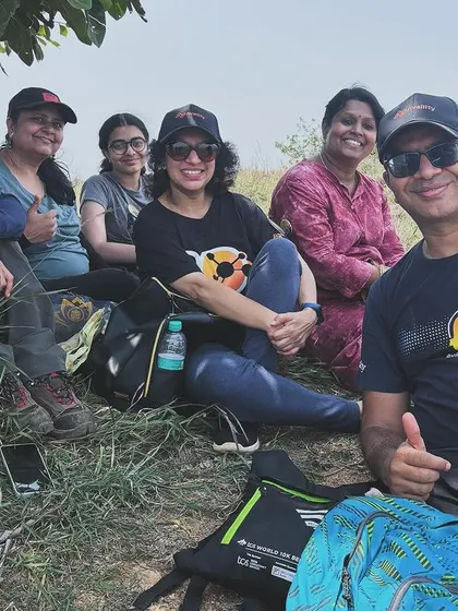 Smiles and thumbs-ups from a happy group. We aim to make every trek a positive and memorable experience that strengthens team bonds.