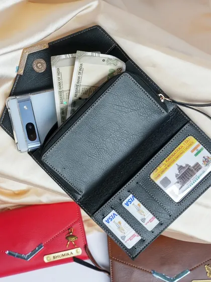 The interior of the Nexa clutch is spacious enough to hold a phone, cash, and cards, making it a perfect all-in-one wallet and clutch.