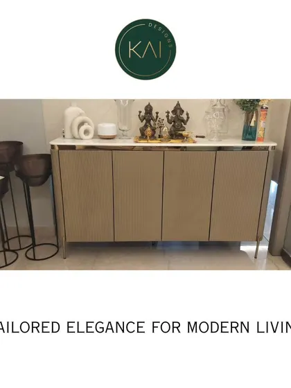 A sleek, modern console with a white marble top and a simple, elegant frame. This piece is shown in a client's entryway, demonstrating how our furniture provides tailored elegance for modern living.