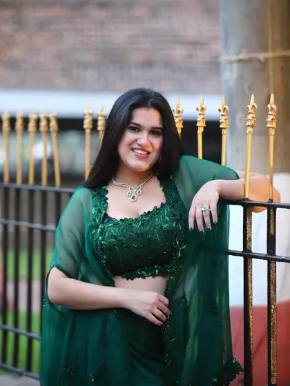 Another shot of this beautiful green ensemble. The makeup is designed to be glamorous yet feel light and comfortable.