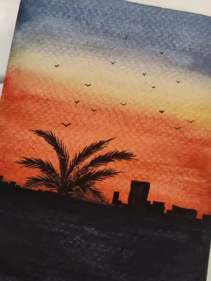 The full view of the sunset landscape painting, showing the gradient of the sky from orange to blue.