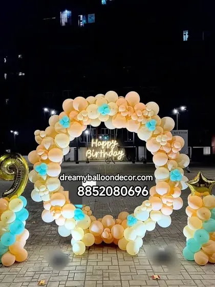 A birthday celebration set up in an outdoor parking area. This shows that I can create a beautiful and complete party backdrop anywhere you need it.