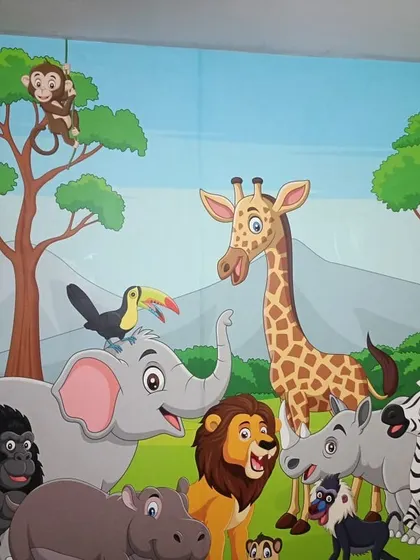 Another variation of the cartoon jungle animal theme, installed in a child's bedroom.