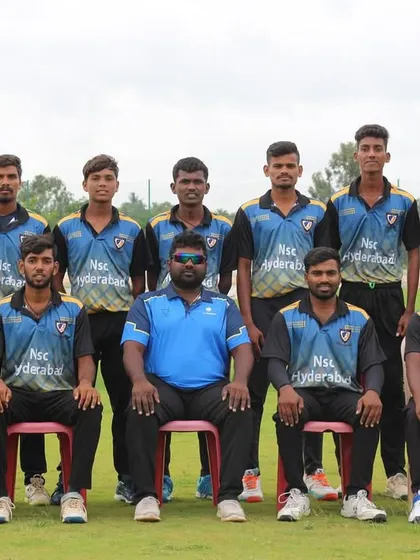 The NSC Hyderabad team poses for a classic team photograph on the field before their match.