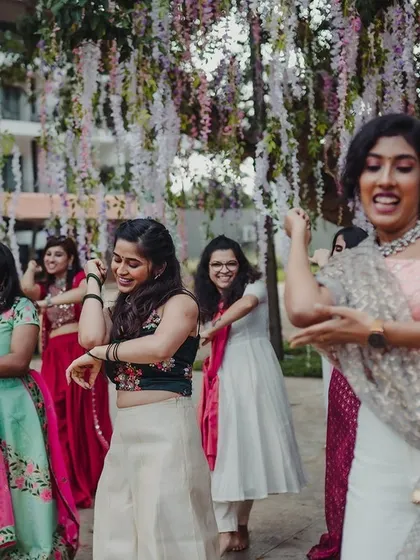 The bridesmaids join the bride for a dance performance at the Sangeet. We create spaces that are perfect for group choreographies and celebrations.