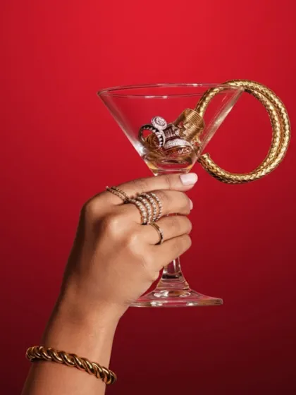 Pop the champagne and stack the jewels. This festive image celebrates the new year with a martini glass full of our stackable rings and bracelets.