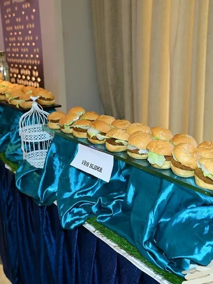 A long table display of our popular veggie sliders, a great choice for casual parties and events.