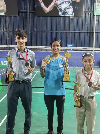 Three of my players showcasing their CBSE medals. We brought home one gold and two bronze medals, proving our strength across different age groups.